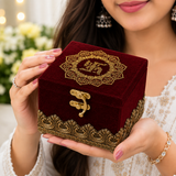 Elegant burgundy velvet wood box with intricate gold filigree design and decorative clasp