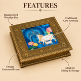 Features image of the Wood Cow Design Box highlighting the handcrafted decorative design, ornate embossed detailing, gold-toned finish, floral carved border, and artistic cow and calf motif in the center. The image is styled to showcase the premium craftsmanship and elegant traditional look of the box against a clean beige background.