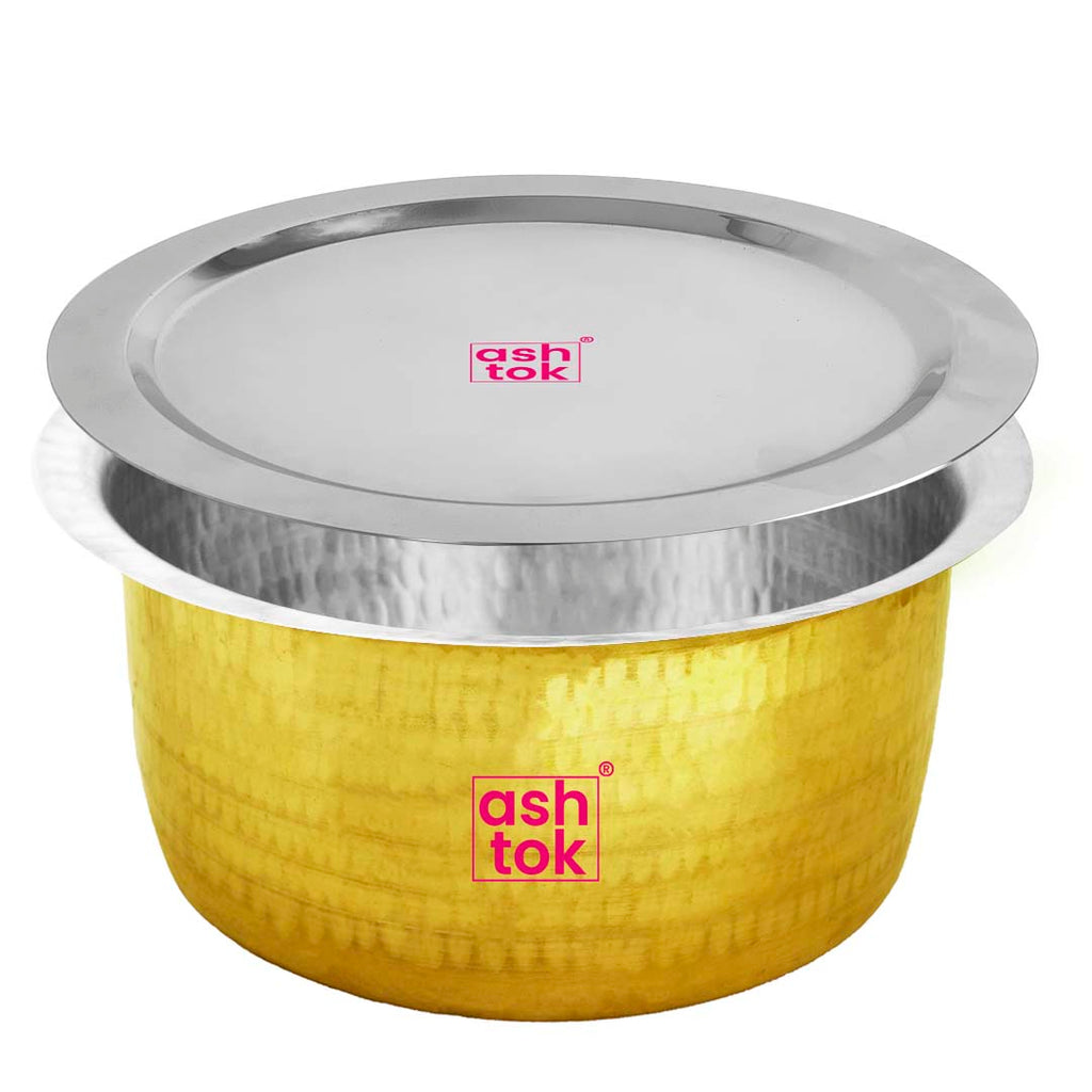 Traditional hammered brass tope featuring tin lining for safe cooking, ideal for Indian kitchens and festive cooking.