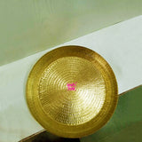 Traditional brass tambalam thali with hammered design, ideal gift for weddings, engagements and special occasions.